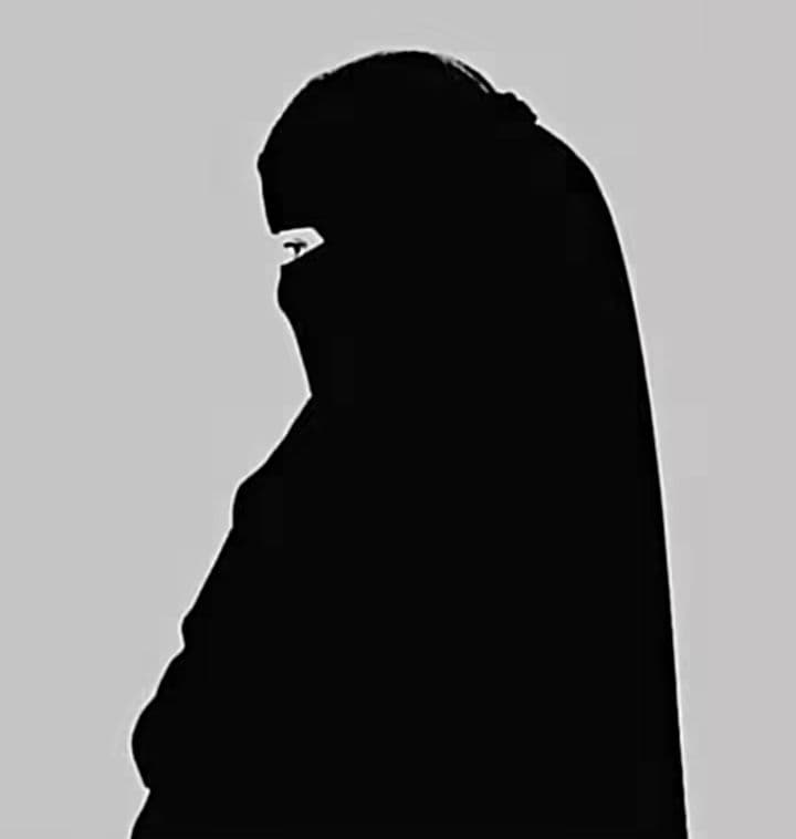 Silhouette portrait of the designer in profile, no face shown.